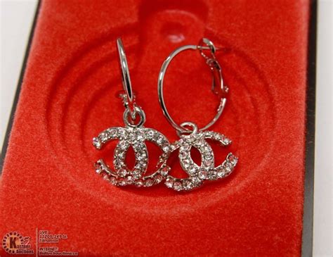 fake coco chanel earrings|counterfeit channel earrings.